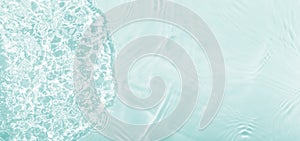 Water panoramic banner background. Water texture, water surface with rings and ripple. Spa concept background. Flat lay, top view