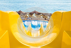 Water park, top yellow water slide, Closeup