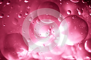 Water on pink background