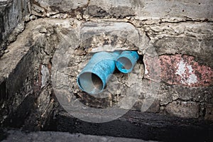 Water pipe in dirty sewer