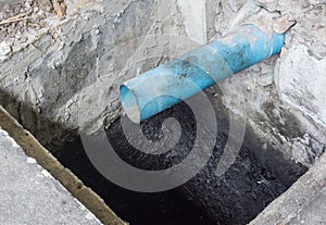 Water pipe in dirty sewer