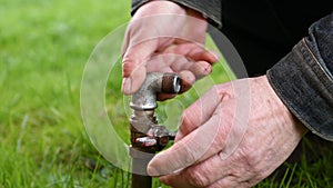 Water pipe for hose in grass