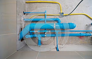 The water pipe system, wastewater pipes and electrical wiring are neatly installed under the ceiling