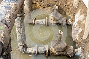 Water pipe valves in a trench