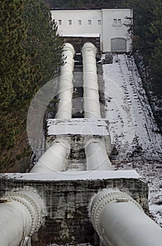 Water pipeline transporting water to an Hidro-Electric power station  in wintertime photo