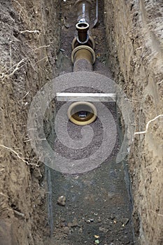Water pipes in ditch photo