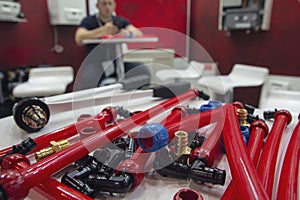 Water pipes PEX and mounting tools on the table