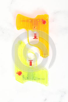water pistol green on white background isolated