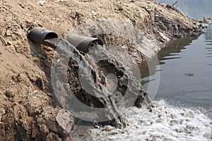 Water pollution in river photo