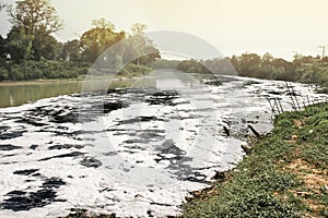 Water pollution in river photo