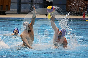 Water polo action - throwing the ball