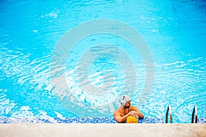 Water polo player in a swimming pool.