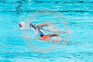 Water polo players in competition