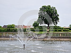 Water pool and fountaint in flower gardens Kvetna Zahrada in Kromeriz in spring