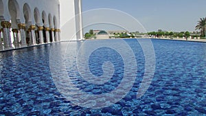 A water pool in front of a great mosque in Abu Dhabi, UAE.