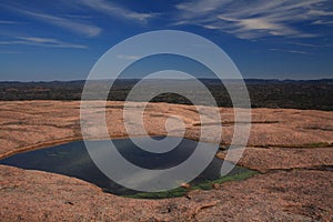 Water pool on top of enchanted rock