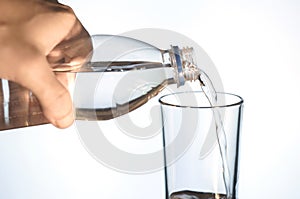 water is poured into a glass