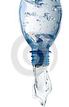 Water Pouring out of Plastic Bottle - Isolated