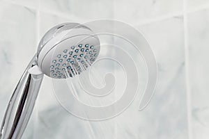 Water pours from the shower, close-up