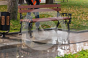 water with pressure wash paths in the park, street cleaning