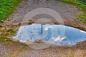 Water Puddle With Reflexion. Isolated.