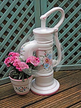 Water pump garden ornament flowers