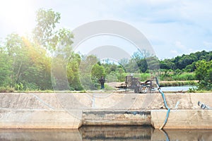Water pumping diesel engine working for irrigation from river, agriculture technology