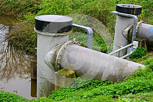 Water pumps in Lier, Belgium, safeguarding elevated homes from flooding in heavy rain. photo