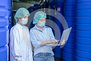 Water quality control officer engineer team inspect water tanks in beverage industry factory for ensure cleanliness standards