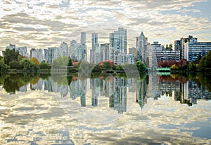 Water reflection view of the skyscrapers. The photo was taken around Lost Lagoon, Stanley Park in Vancouver BC. You would love