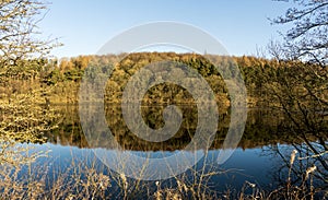 Water reflections on a calm day at Fewston Reservoir, North Yorkshire