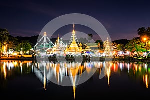 Water Reflections of Wat Phra That Nhong Jong Kham temple photo