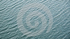 Water ripples. Aerial view over sea or ocean with beautiful waves pattern Landscapes view of endless aquamarine sea water in summe