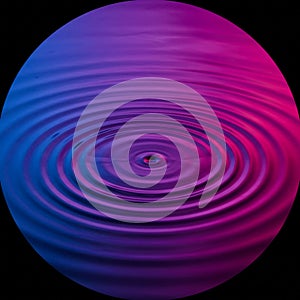 Water ripples emanate from a central point, creating concentric circles. The surface