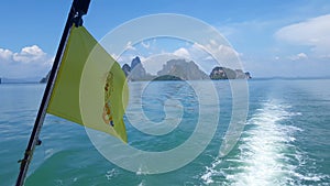 Water ripples forming behind speed boat in Phi Phi Island