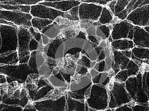 Water ripples reflection on pool floor