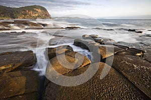 water between the rocks on the coastline