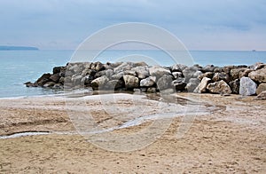 Water and rocks winter beach