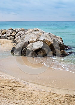 Water and rocks winter beach