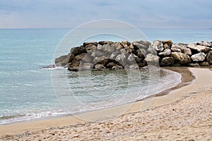 Water and rocks winter beach