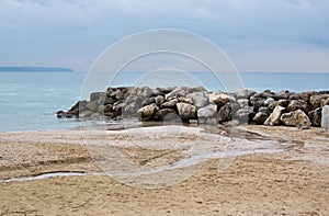 Water and rocks winter beach