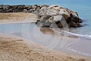 Water and rocks winter beach