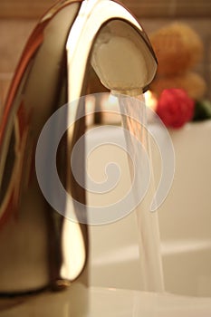Water Running Out of Faucet