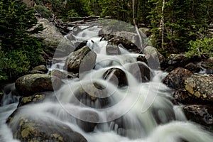 Water Rushes Over Boulders In Unknown Creek