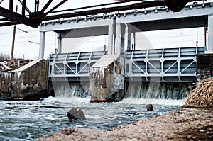 Water rushing through gates at a dam