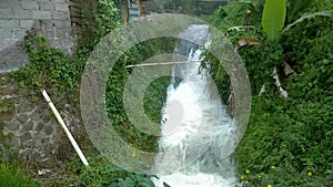 Water rushing in the rural irrigation canal