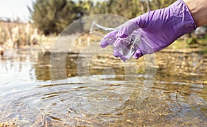 Water sample and purity analysis test, liquid in laboratory glassware photo