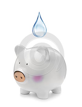 Water scarcity concept. Piggy bank and drop on white background