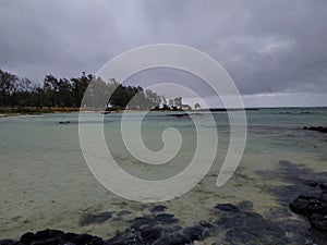 water shore sea river coast bay cloud wave beach ocean lake reservoir reflection nature rock sky waterway Mauritius 2