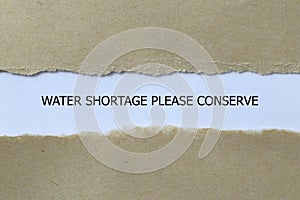 water shortage please conserve on white paper